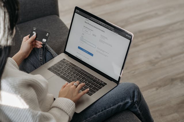 A secure payment transaction screen on a laptop, representing safe selling on Gumroad